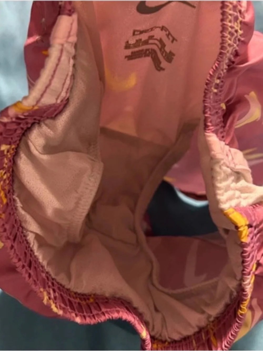 Nike Mauve-Pink Athletic Shorts with Yellow & White Swoosh Print